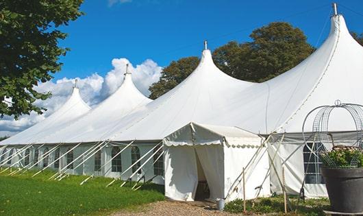 a line of sleek and modern portable toilets ready for use at an upscale corporate event in Parkland